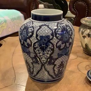 Blue and white vase with a lid